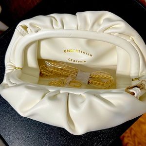 UNDERSTATED LEATHER Crescent Clutch NEW!!